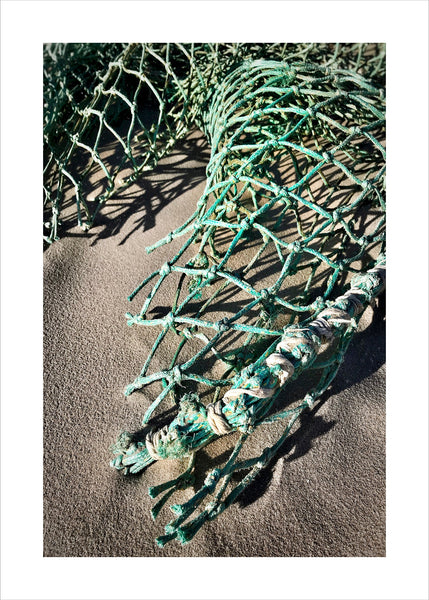 Net in zand | POSTER